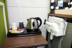 Set per la preparazione di tè e caffè presso HOTEL ViA