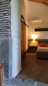 Una cama o camas en una habitación de Lavica - Country Guest House