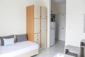 Kuchyň nebo kuchyňský kout v ubytování Iason Apartments