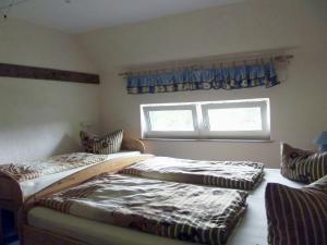 Postel nebo postele na pokoji v ubytování Pension Lindenhof