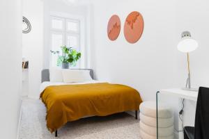Posteľ alebo postele v izbe v ubytovaní Warsaw Concierge Koneser