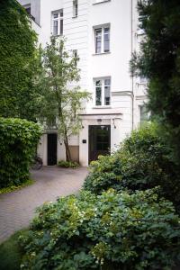 Vonkajšia záhrada v ubytovaní Warsaw Concierge Koneser