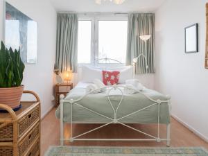 Pass the Keys Spacious 2Bedroom flat with views in London Bridge tesisinde bir odada yatak veya yataklar