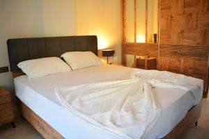 Postel nebo postele na pokoji v ubytování Kemer Babel Residence