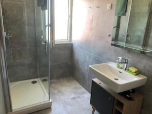 Koupelna v ubytování Priscilla Apartment + 25 fotografií
