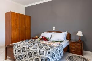 Postel nebo postele na pokoji v ubytování Dinos Hotel
