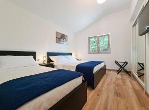 Posteľ alebo postele v izbe v ubytovaní House Peroj 2118