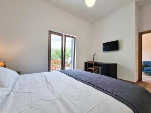 Posteľ alebo postele v izbe v ubytovaní House Peroj 2118