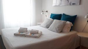 Llit o llits en una habitació de A Casinha da Tita - Moradia com Terraço