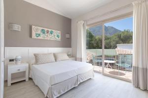 Posteľ alebo postele v izbe v ubytovaní Eliantos Boutique Hotel & Spa + 37 fotografií