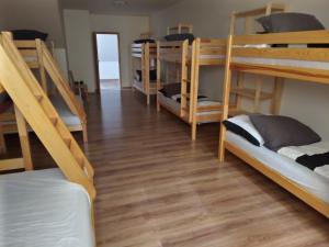 A bed or beds in a room at Žrebčín Mlynčok
