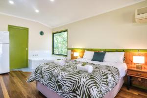 Ένα ή περισσότερα κρεβάτια σε δωμάτιο στο Getaways at Byfield
