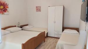 Posteľ alebo postele v izbe v ubytovaní Apartment Jerolima