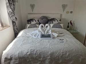 Ένα ή περισσότερα κρεβάτια σε δωμάτιο στο Villa kerangoues gîte 3 étoiles