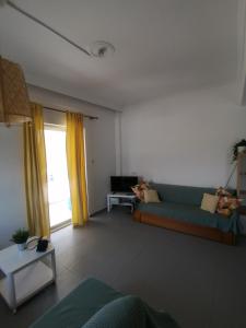 Χώρος καθιστικού στο Elef Apartment