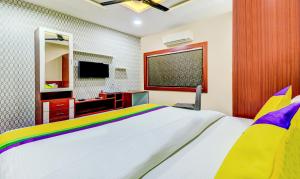 TV o dispositivi per l'intrattenimento presso Itsy Hotels Aasma Luxury Villa