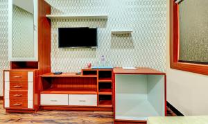 TV o dispositivi per l'intrattenimento presso Itsy Hotels Aasma Luxury Villa