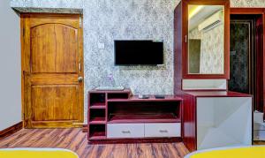 TV o dispositivi per l'intrattenimento presso Itsy Hotels Aasma Luxury Villa