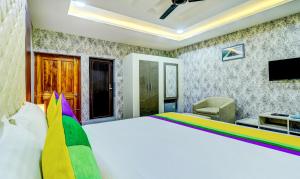 TV o dispositivi per l'intrattenimento presso Itsy Hotels Aasma Luxury Villa