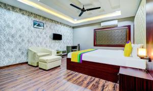 TV o dispositivi per l'intrattenimento presso Itsy Hotels Aasma Luxury Villa
