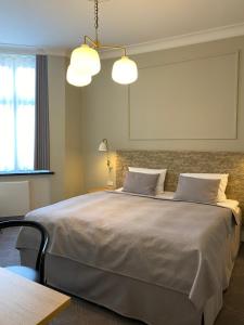 Letto o letti in una camera di Hotel Randers