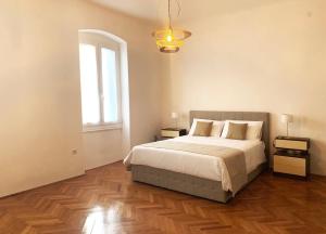 Posteľ alebo postele v izbe v ubytovaní Apartment Porto Poreč