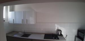 Kuchyňa alebo kuchynka v ubytovaní Apartment Porto Poreč