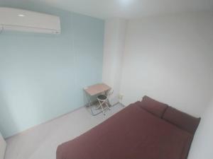 Voodi või voodid majutusasutuse Simple Stay Miyajima toas