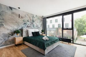 Postel nebo postele na pokoji v ubytování Easy Rent Apartments - GOLD 30, Centrum 24h Check-in