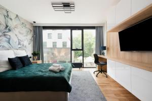 Postel nebo postele na pokoji v ubytování Easy Rent Apartments - GOLD 30, Centrum 24h Check-in