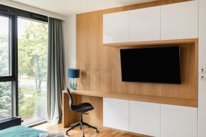 TV a/nebo společenská místnost v ubytování Easy Rent Apartments - GOLD 30, Centrum 24h Check-in