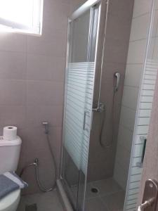 Koupelna v ubytování THALASSA ALMYROS APARTMENTS