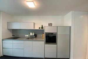 A kitchen or kitchenette at Riversuite