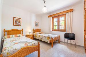 Postel nebo postele na pokoji v ubytování Villa la Rafal + 17 fotografií