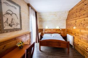 Uma cama ou camas num quarto em Hotel Enigma