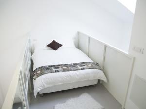 Brand new apartments Ortiquattro tesisinde bir odada yatak veya yataklar