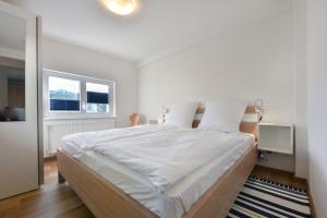 Ein Bett oder Betten in einem Zimmer der Unterkunft Usedom To Hus