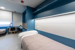 Posteľ alebo postele v izbe v ubytovaní Residencia Universitaria Resa San Mamés