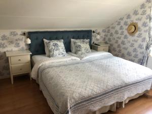 Katil atau katil-katil dalam bilik di Nautic Hotell