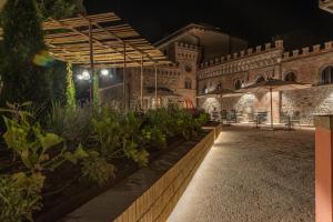 Aed väljaspool majutusasutust Villa Campomaggio Resort & SPA