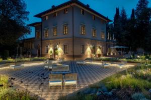 Aed väljaspool majutusasutust Villa Campomaggio Resort & SPA