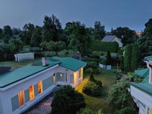 an aerial view of a house with a green roof at Allika Holiday House in Pärnu