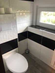 Koupelna v ubytování Dom Wakacyjny Parkowa + 33 fotografií