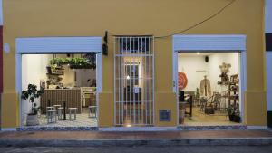 a store front with two doors and a kitchen at Hotel San Telmo in Buga