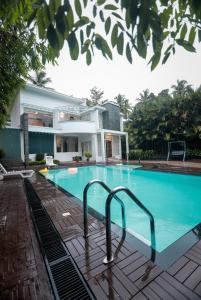 Mukkam的住宿－Square Villa Residency Luxury 1 Bed Room Villa with Private Pool，相簿中的一張相片