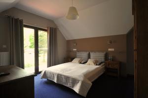 Ένα ή περισσότερα κρεβάτια σε δωμάτιο στο Vertigo Narie