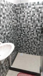 Phòng tắm tại Hospedagem Roze -