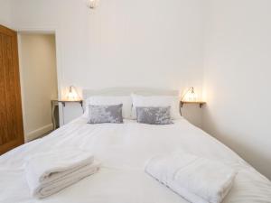 Voodi või voodid majutusasutuse The Burrow toas