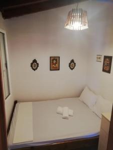 Postel nebo postele na pokoji v ubytování Kastraki Villas