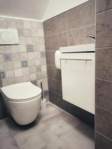 Koupelna v ubytování Anita Apartman